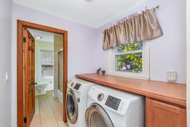 28 Sterling St, Weymouth, MA 02188 - laundry area featuring independent washer and dryer and plenty of natural light