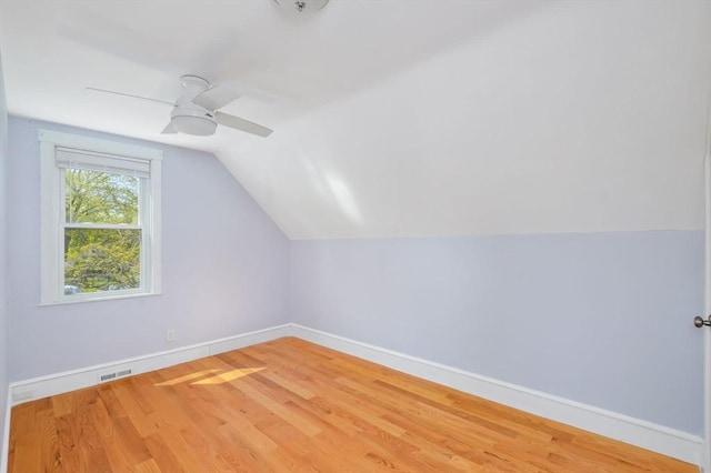 28 Sterling St, Weymouth, MA 02188 - additional living space featuring baseboards, ceiling fan, lofted ceiling, and wood finished floors