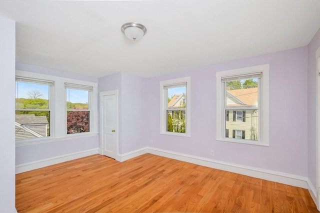 28 Sterling St, Weymouth, MA 02188 - unfurnished room with baseboards and light wood finished floors