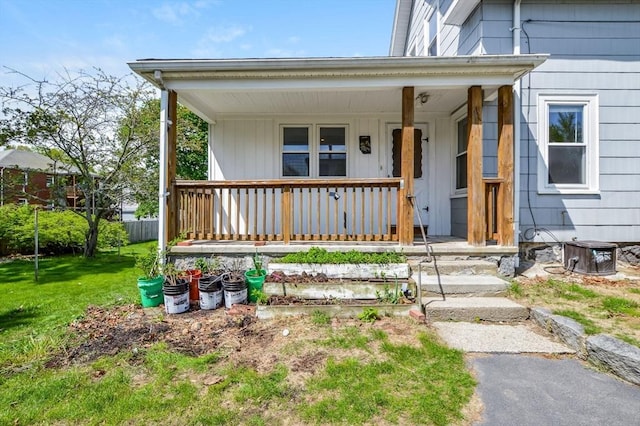 28 Sterling St, Weymouth, MA 02188 - entrance to property with covered porch and a lawn
