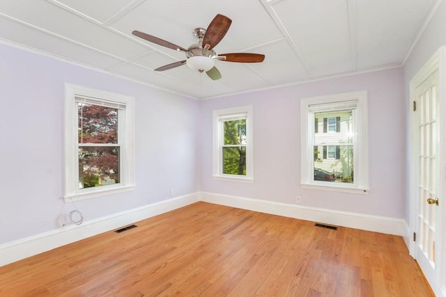 28 Sterling St, Weymouth, MA 02188 - empty room with light wood-style floors, baseboards, ornamental molding, and ceiling fan