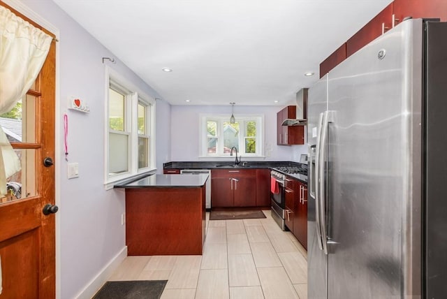 28 Sterling St, Weymouth, MA 02188 - kitchen featuring stainless steel appliances, dark countertops, wall chimney range hood, dark brown cabinets, and recessed lighting