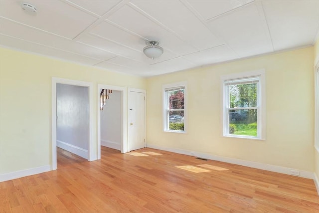28 Sterling St, Weymouth, MA 02188 - empty room featuring baseboards, a smoke detector, and light wood-style floors