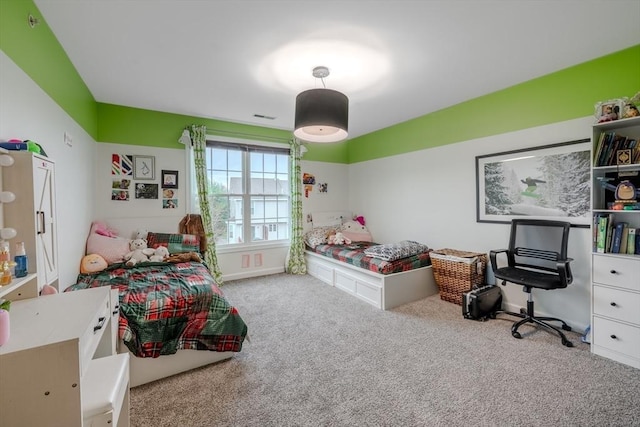 carpeted bedroom with visible vents