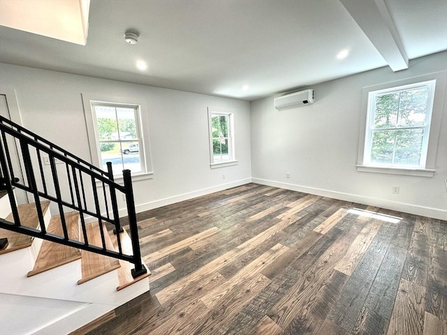 90 Bald Mountain Rd, Bernardston, MA 01337 - spare room with healthy amount of natural light, dark wood-style floors, a wall mounted AC, recessed lighting, and beamed ceiling