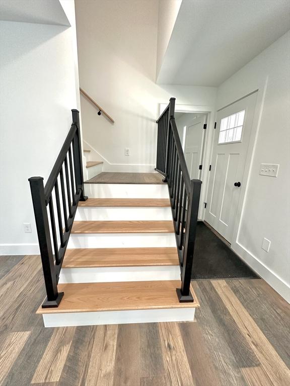 90 Bald Mountain Rd, Bernardston, MA 01337 - stairs featuring wood finished floors and baseboards