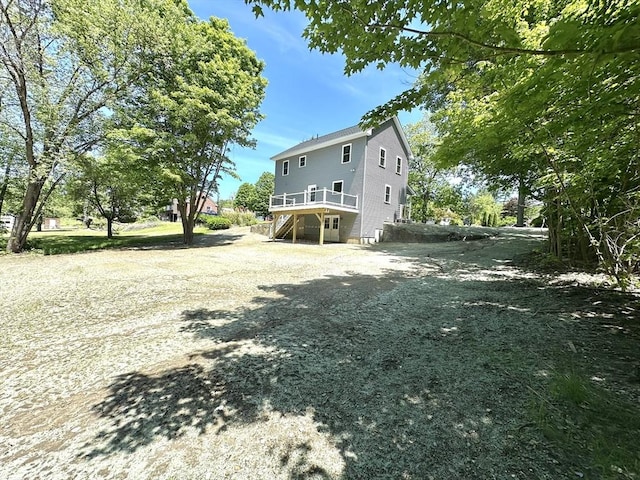 90 Bald Mountain Rd, Bernardston, MA 01337 - rear view of house with stairs, driveway, and a wooden deck