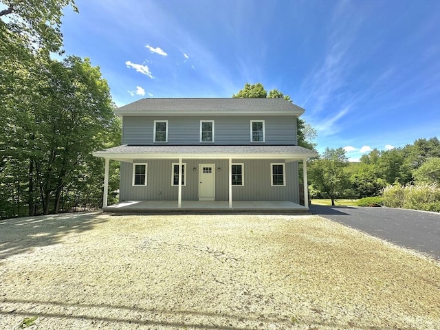 90 Bald Mountain Rd, Bernardston, MA 01337 - view of front of home with a shingled roof, a porch, and gravel driveway