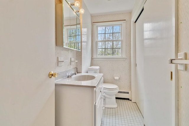 10 Mallard Rd, Acton, MA 01720 - half bath featuring a baseboard radiator, toilet, and vanity