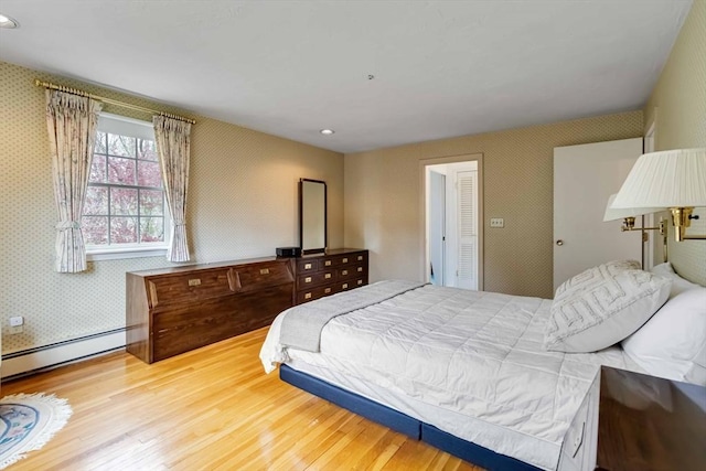 10 Mallard Rd, Acton, MA 01720 - bedroom featuring wallpapered walls, recessed lighting, baseboard heating, and wood finished floors