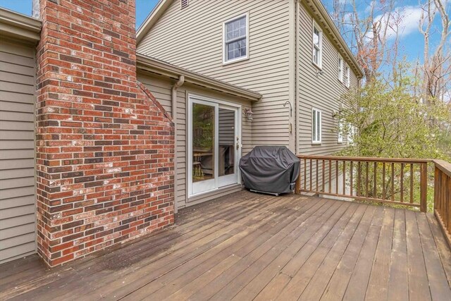 10 Mallard Rd, Acton, MA 01720 - wooden deck with a grill