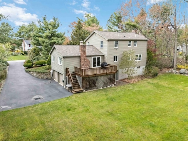10 Mallard Rd, Acton, MA 01720 - back of property with a garage, stairway, a wooden deck, a chimney, and a lawn