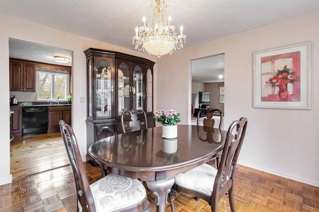 10 Mallard Rd, Acton, MA 01720 - dining room featuring an inviting chandelier and baseboards