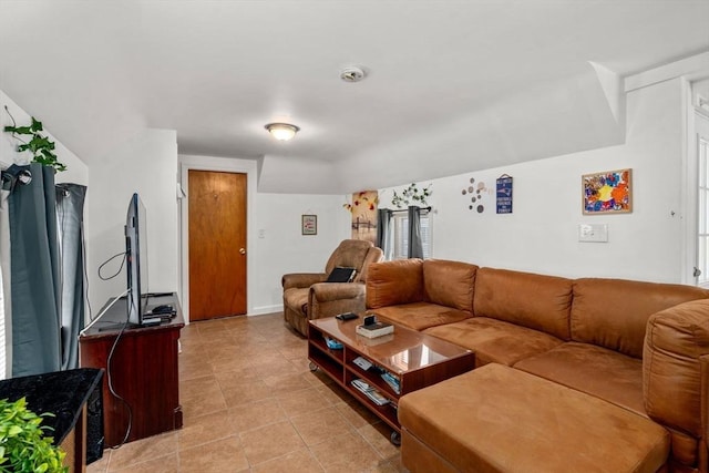 living room featuring light tile patterned flooring