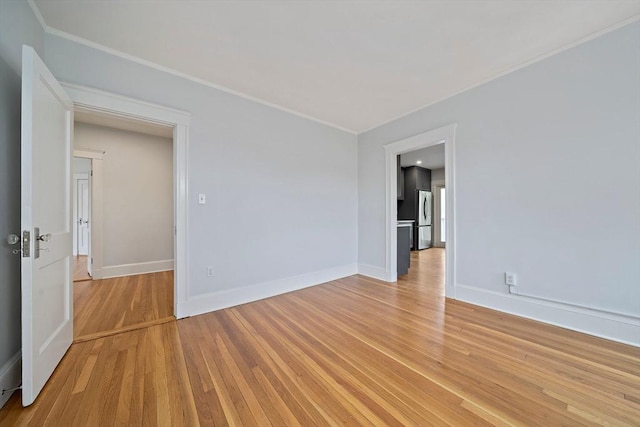 32 Gibson Unit 2, Boston, MA 02122 - unfurnished room with ornamental molding and light wood finished floors