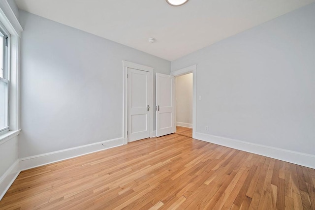 32 Gibson Unit 2, Boston, MA 02122 - empty room with light wood-style flooring and a smoke detector