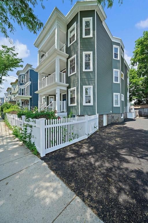 32 Gibson Unit 2, Boston, MA 02122 - view of front of property featuring a fenced front yard