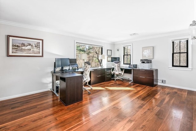 home office with wood-type flooring and ornamental molding