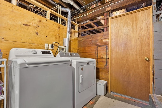 laundry room featuring washing machine and clothes dryer