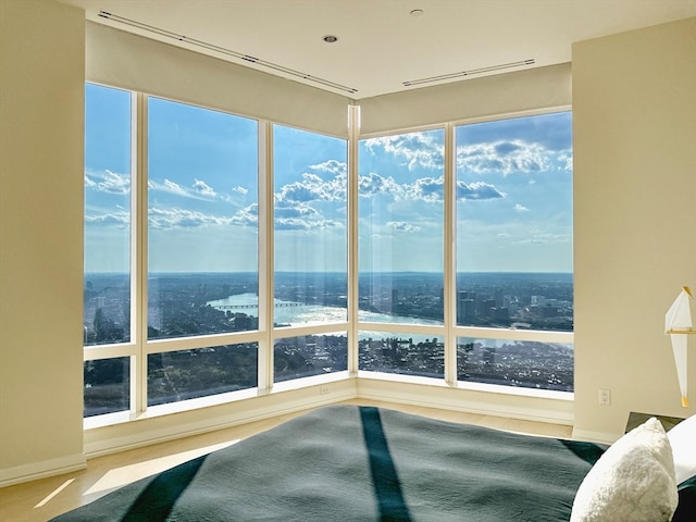 bedroom featuring a water view