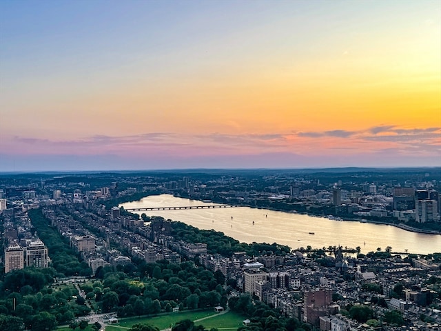 aerial view at dusk with a water view