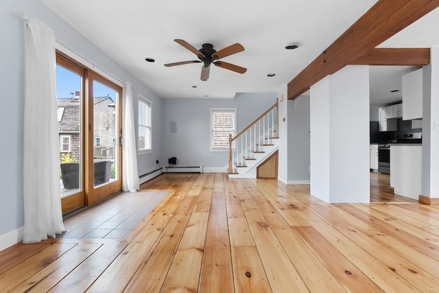 80 Lennox Rd Unit 1, Nahant, MA 01908 - foyer entrance featuring light wood-style flooring, stairway, a ceiling fan, a baseboard radiator, and baseboards