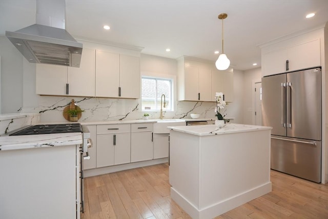 57 Garrison Ave Unit 57, Somerville, MA 02144 - kitchen featuring high quality fridge, wall chimney range hood, white gas range oven, light wood-style floors, and recessed lighting
