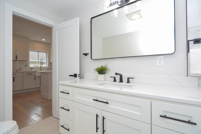 57 Garrison Ave Unit 57, Somerville, MA 02144 - bathroom with vanity and hardwood / wood-style floors