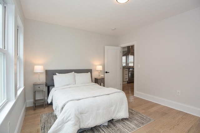 57 Garrison Ave Unit 57, Somerville, MA 02144 - bedroom featuring baseboards and light wood-style flooring