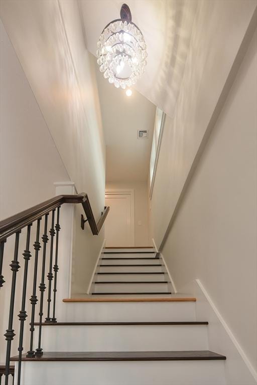57 Garrison Ave Unit 57, Somerville, MA 02144 - staircase featuring a chandelier