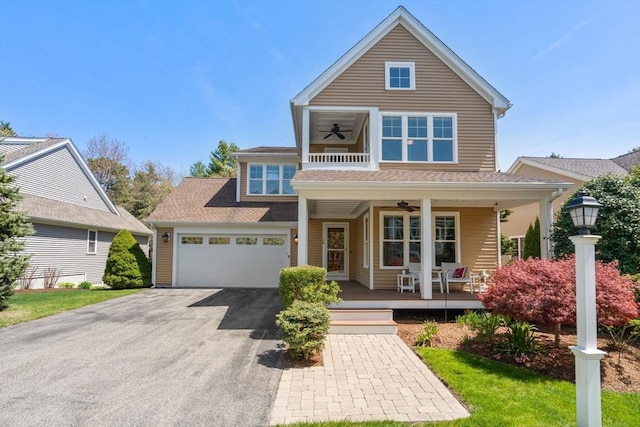 16 Boatwrights Loop, Plymouth, MA 02360 - view of front of house with covered porch, aphalt driveway, ceiling fan, and an attached garage