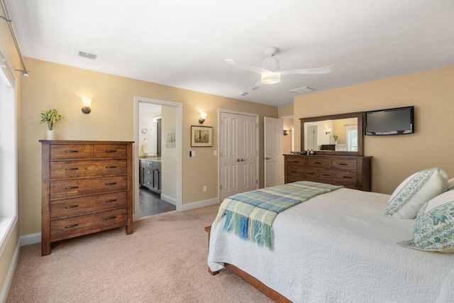 16 Boatwrights Loop, Plymouth, MA 02360 - bedroom with ensuite bathroom, visible vents, ceiling fan, and light carpet
