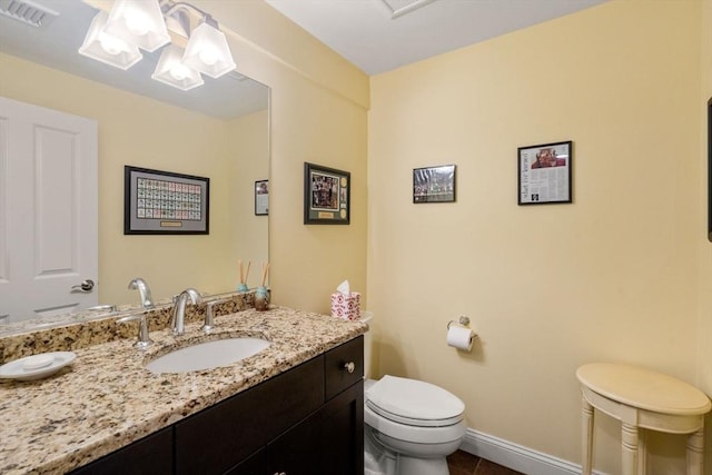 16 Boatwrights Loop, Plymouth, MA 02360 - half bathroom with toilet, tile patterned floors, visible vents, baseboards, and vanity