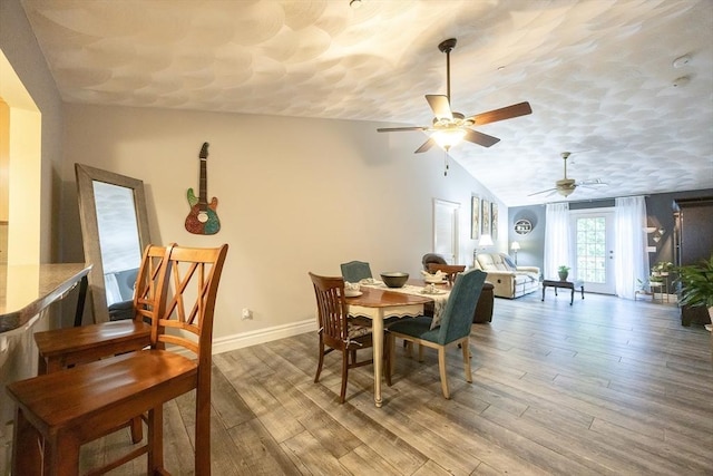 65 Bliss Ave Unit 4, Attleboro, MA 02703 - dining area featuring ceiling fan, vaulted ceiling, and wood finished floors