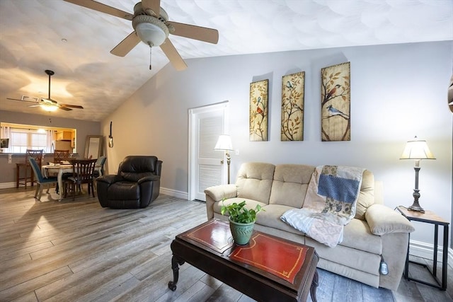 65 Bliss Ave Unit 4, Attleboro, MA 02703 - living room with ceiling fan, vaulted ceiling, and wood finished floors