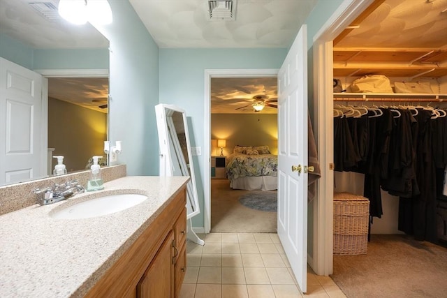 65 Bliss Ave Unit 4, Attleboro, MA 02703 - bathroom with vanity, tile patterned flooring, ensuite bath, and ceiling fan