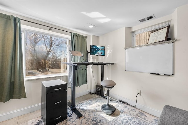 interior space with visible vents and baseboards