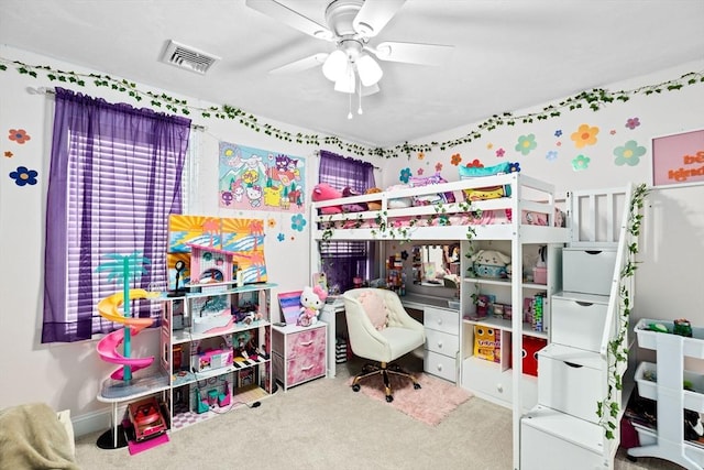 carpeted bedroom featuring ceiling fan