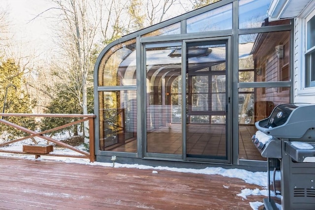 doorway to property with a deck