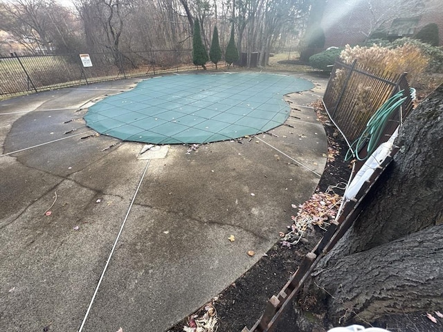 view of swimming pool featuring a patio area