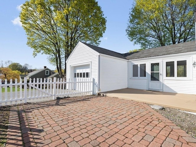 garage featuring fence