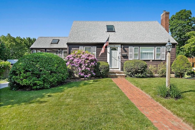 2 Winstead Rd, Weymouth, MA 02189 - view of front of home with a chimney, a front lawn, and a shingled roof