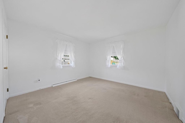 2 Winstead Rd, Weymouth, MA 02189 - carpeted empty room featuring a baseboard radiator, healthy amount of natural light, and baseboards