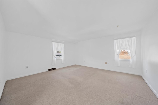 2 Winstead Rd, Weymouth, MA 02189 - unfurnished room featuring healthy amount of natural light, light carpet, and baseboards