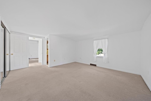 2 Winstead Rd, Weymouth, MA 02189 - additional living space with light colored carpet and baseboards