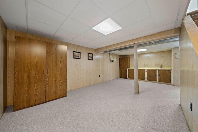 2 Winstead Rd, Weymouth, MA 02189 - finished basement with carpet, a paneled ceiling, and wood walls
