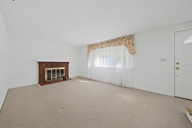 2 Winstead Rd, Weymouth, MA 02189 - unfurnished living room featuring carpet, a fireplace, and baseboards