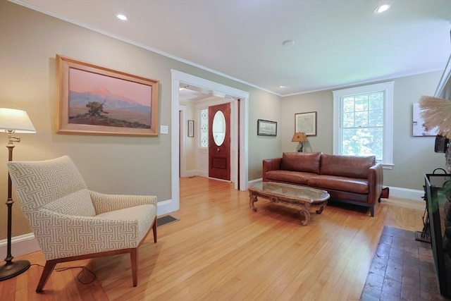 95 Glendale Rd, Sharon, MA 02067 - living room featuring light wood-style floors, crown molding, and recessed lighting