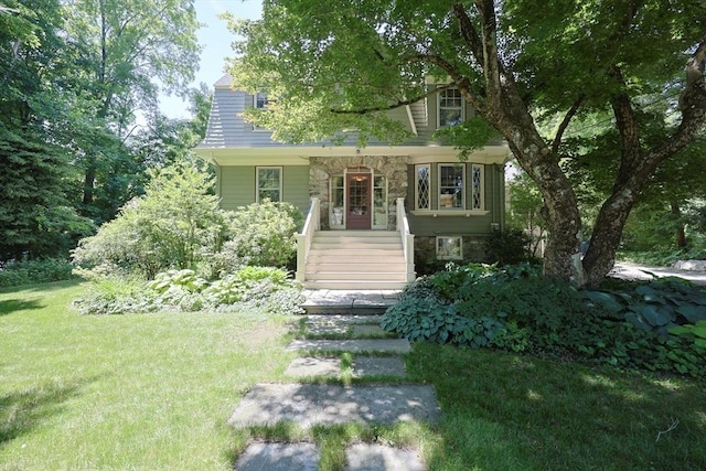 95 Glendale Rd, Sharon, MA 02067 - view of front of house with a front lawn, covered porch, and stone siding