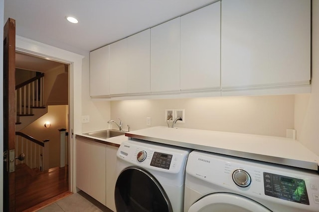 95 Glendale Rd, Sharon, MA 02067 - laundry room with washer and clothes dryer, cabinet space, light tile patterned floors, and recessed lighting
